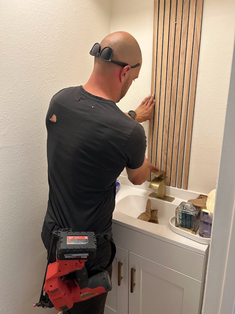 Fitting a slatted timber feature panel above a vanity