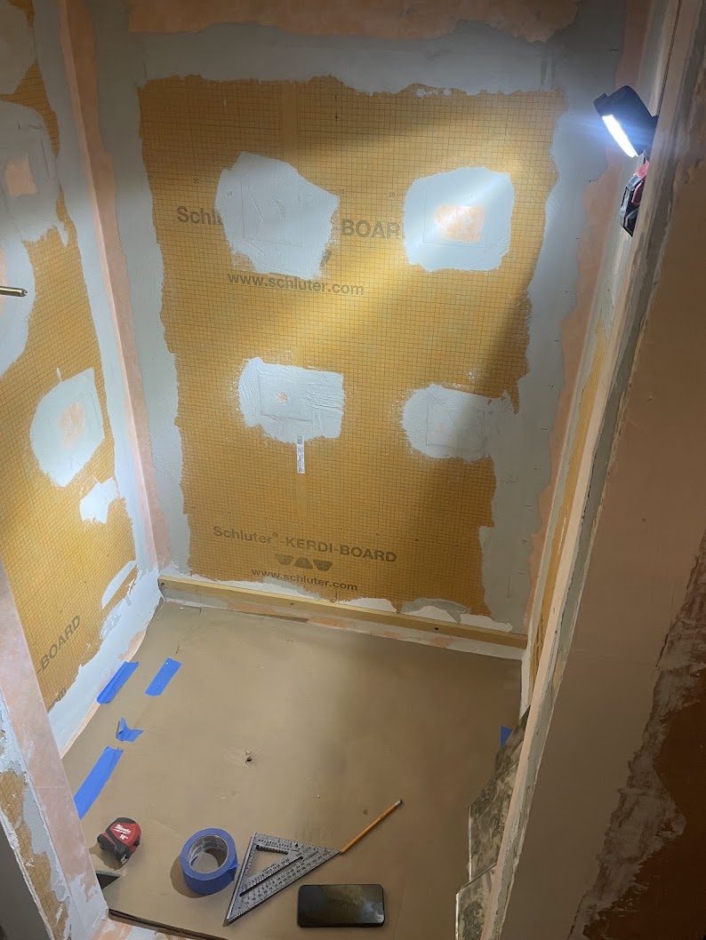 Waterproofing applied before any tile goes on