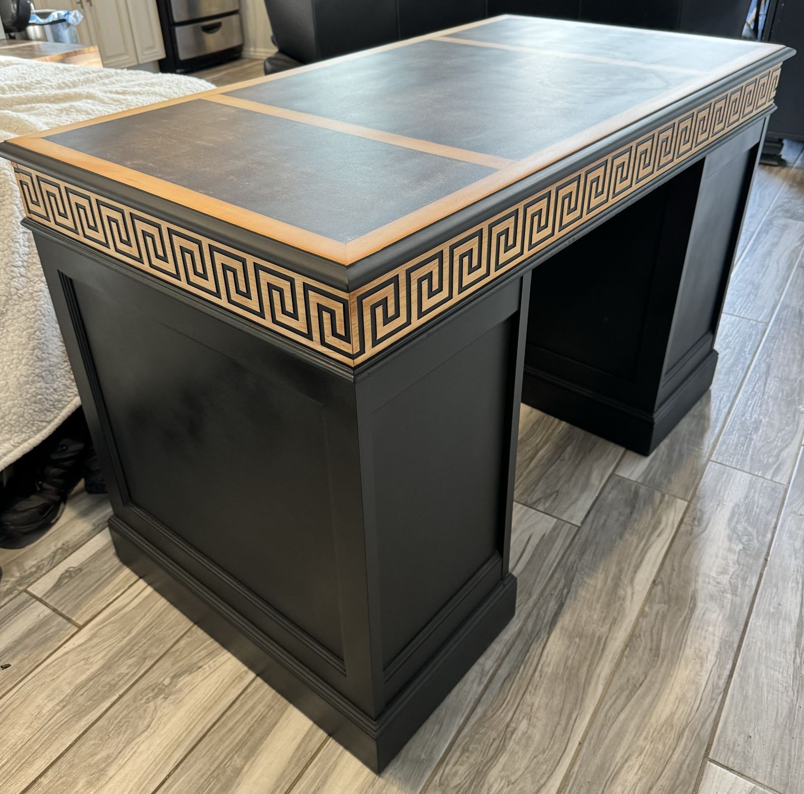 Finished restored desk in black and gold